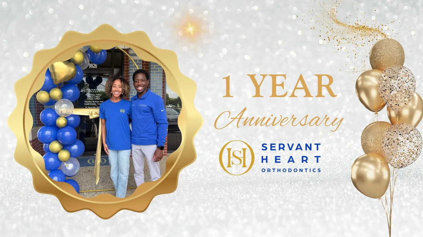 Dr. Ryan Allo and a team member celebrating the Servant Heart Orthodontics one year anniversary